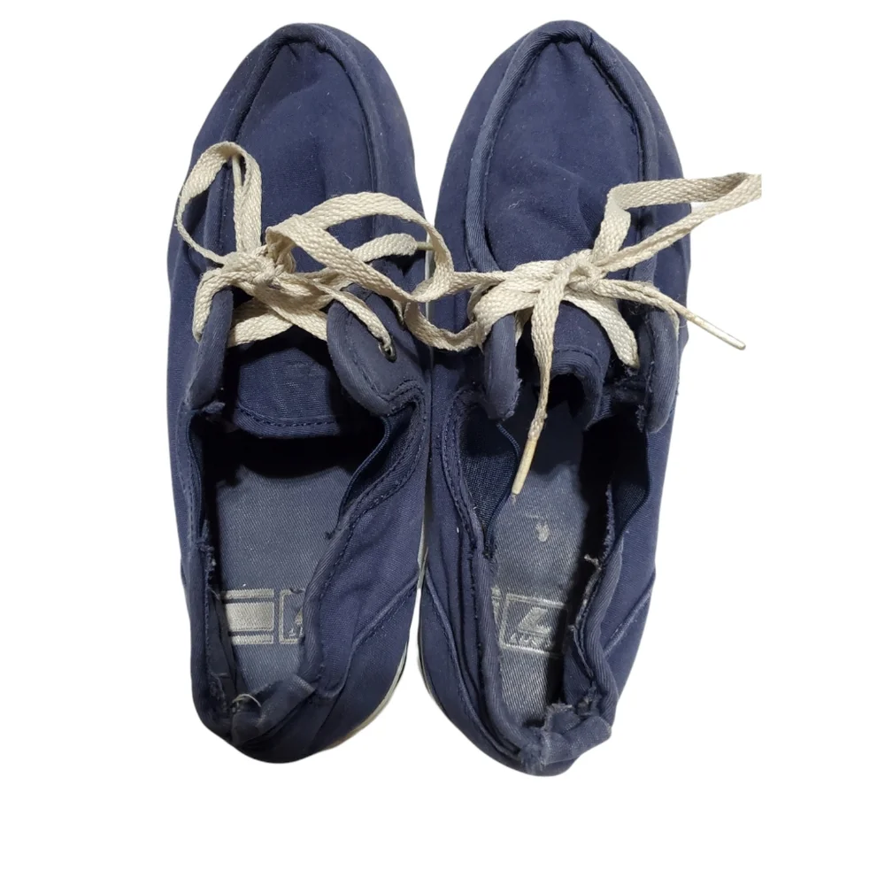 Men's blue and white Lugz sneakers.